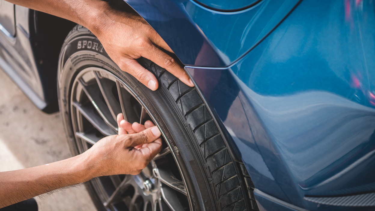 hand removing tire valve cap