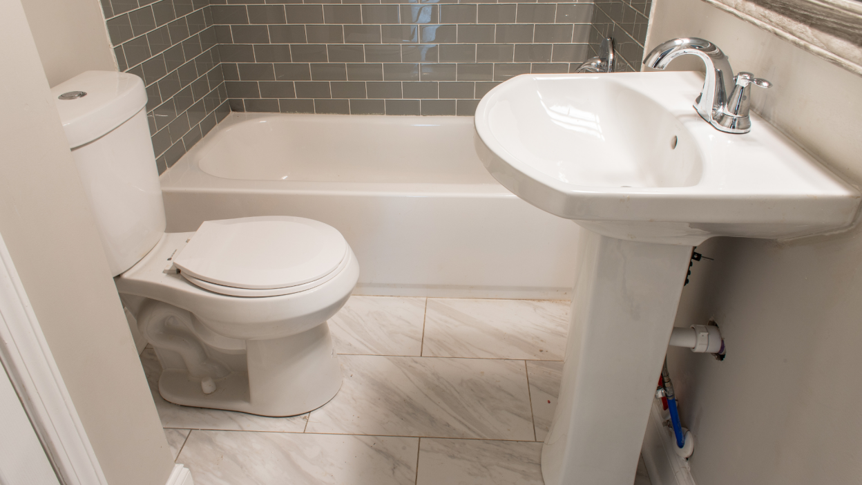 small bathroom decorated in neutral colors