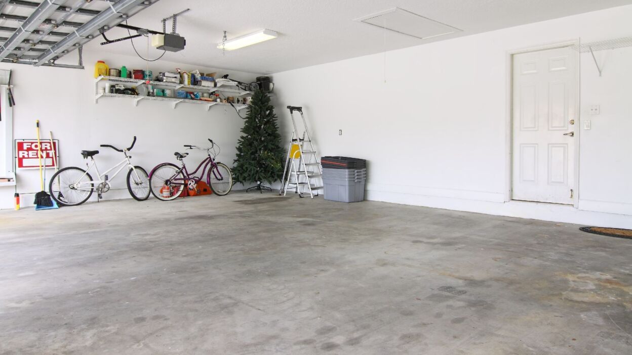 A clean, nearly empty and organized garage