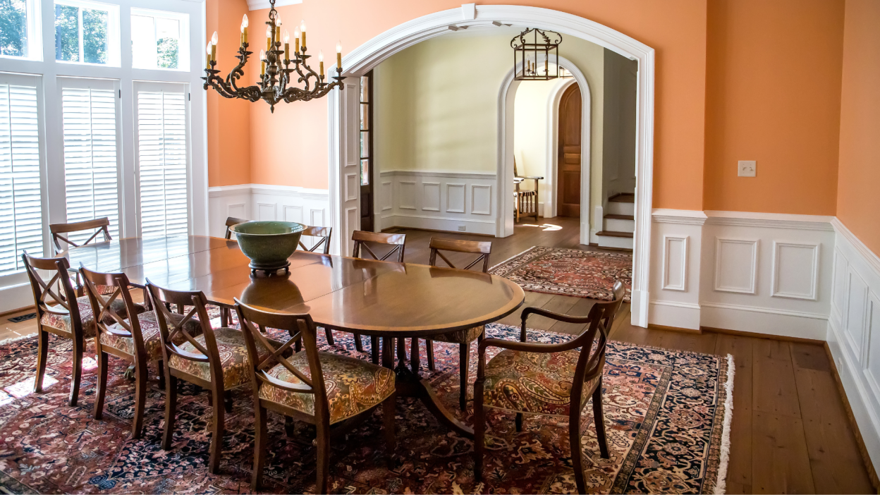 formal dining room with large windows and bright natural light